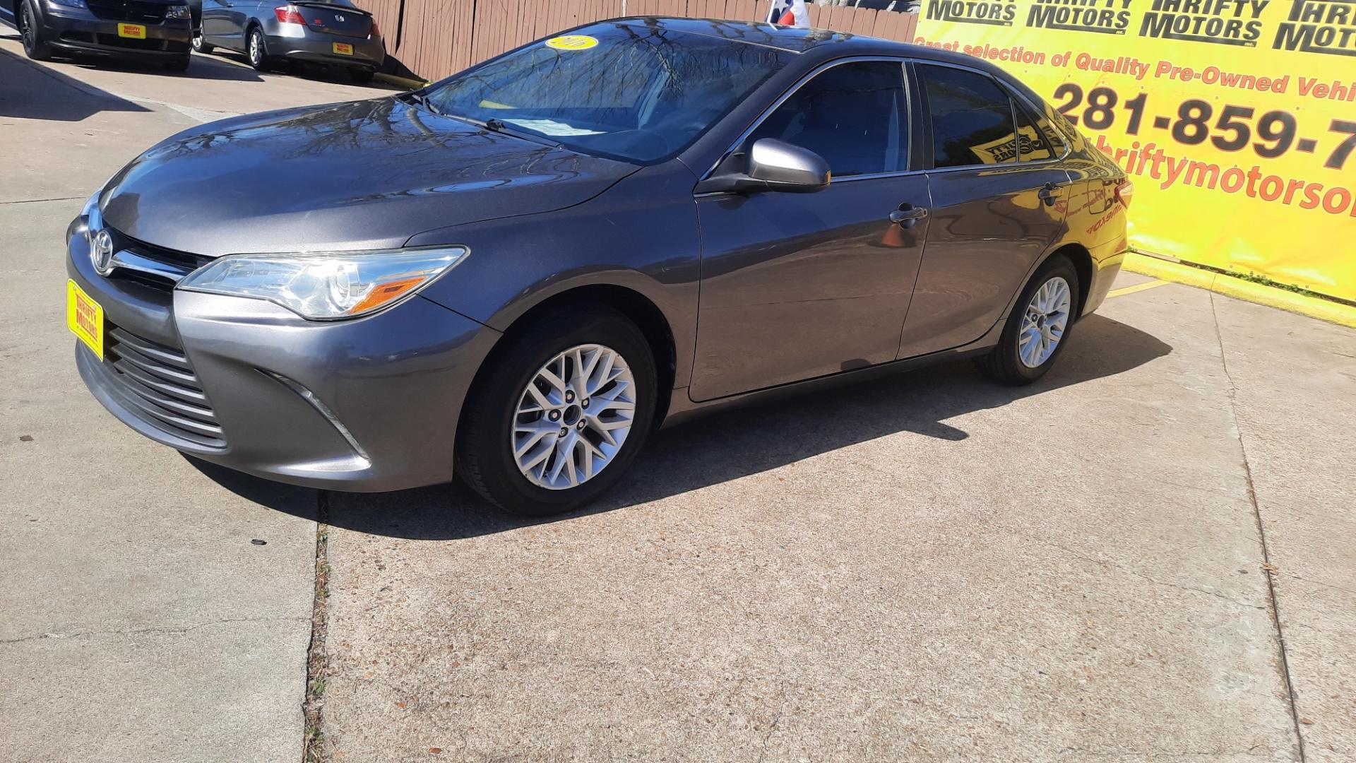 2016 Toyota Camry (4T4BF1FK8GR) , located at 16710 Clay Rd., Houston, TX, 77084, (281) 859-7900, 29.834864, -95.656166 - Photo#2